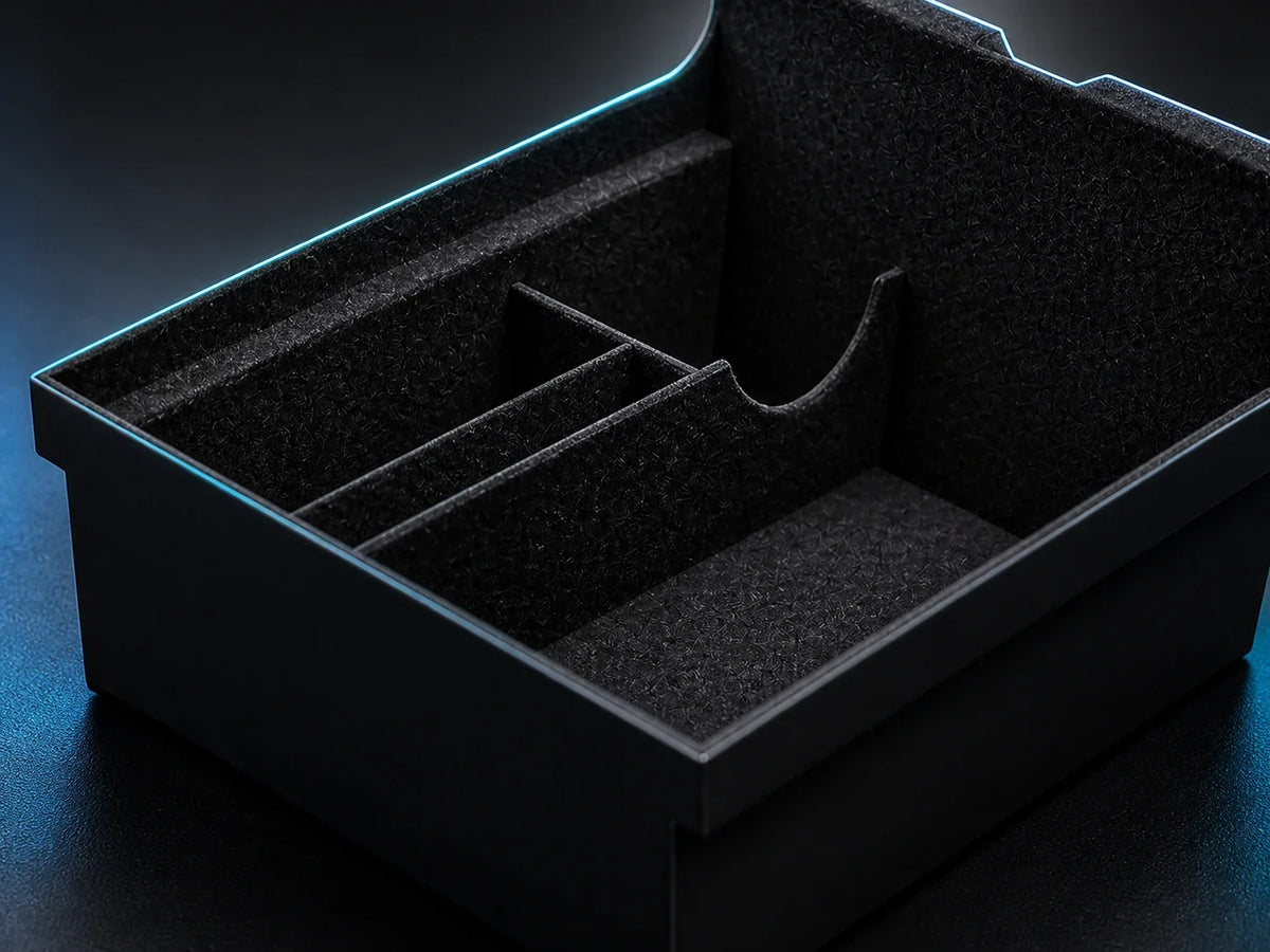 Close-up of the organizer compartments and flocked interior
